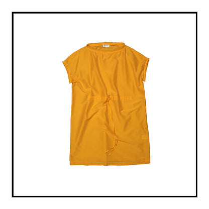 Mustard yellow cover-up dress with round collar, pom details on the collar and sleeve edges, adjustable drawstring waist belt, crafted from 80% cotton and 20% silk, designed for lightweight comfort and elegance.