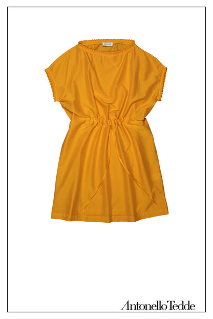 Mustard yellow cover-up dress with round collar, pom details on the collar and sleeve edges, adjustable drawstring waist belt, crafted from 80% cotton and 20% silk, designed for lightweight comfort and elegance.