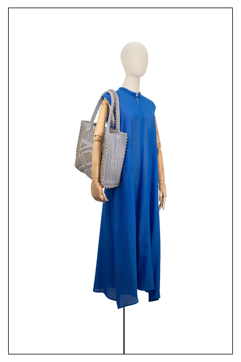 CORD LINEN _SKYBLUE BASE medium tote bag ON MODEL to complete your look with our selection of accessories crafted with the environment in mind