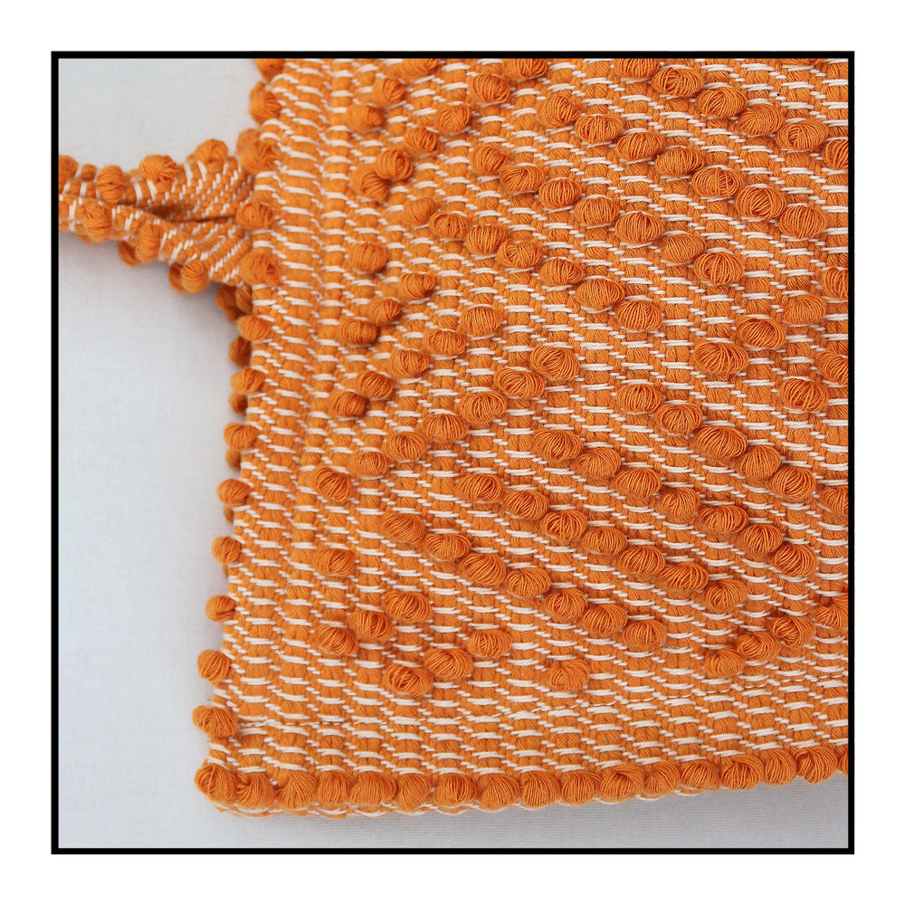 Capriccioli Medium orange with zig zag pattern - The bag is made using authentic Sardinian hand weaving methods in ethically managed factories. This tote bag is extraordinary and evokes faraway cultures with a contemporary touch, with focus on details such as colour, and material that are sustainable and eco-conscious