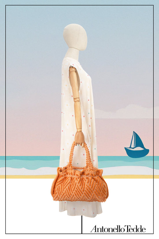 Medium tote bag orange with diamond pattern on a model for proportions it is a winter or summer bag - luxury handbag - handwoven tote made in Italy by hand • timeless individualistic fashion • eco-friendly fashion • socially responsible, lasting fashion