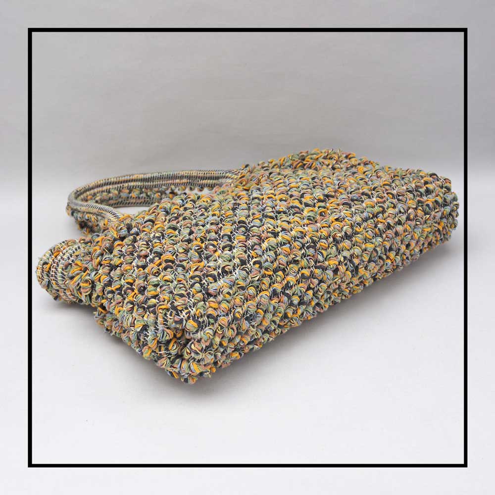 Base view of  tote with gathered top and melange multicoloured yarn The best eco luxury bags and accessories brand. Stylish clothes and Eco-Friendly with recycled yarns